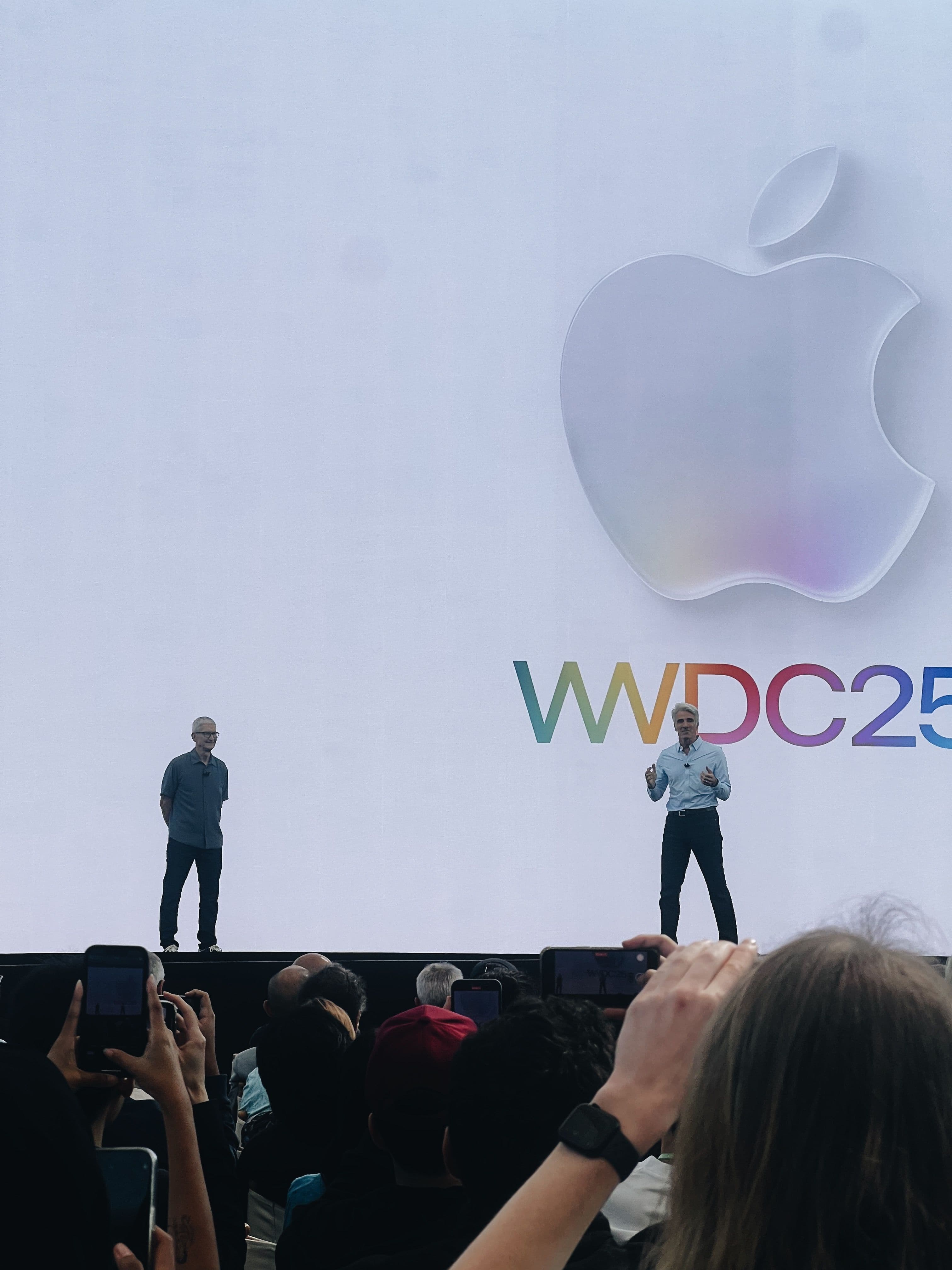 Tim Cook and Craig Federighi on stage